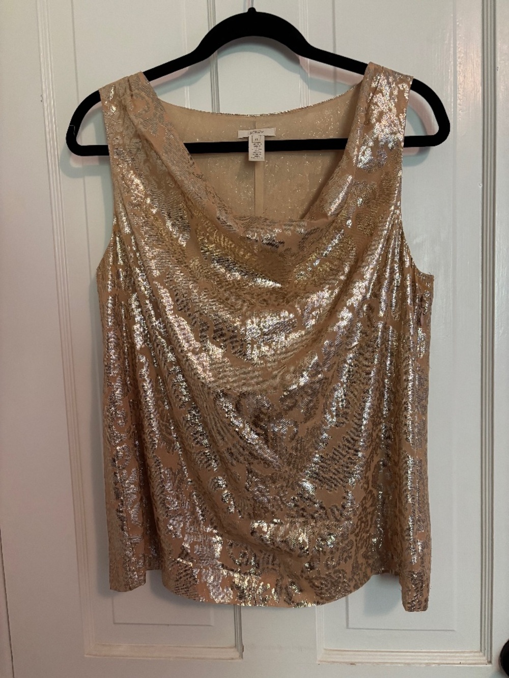 Peachy colored with gold top